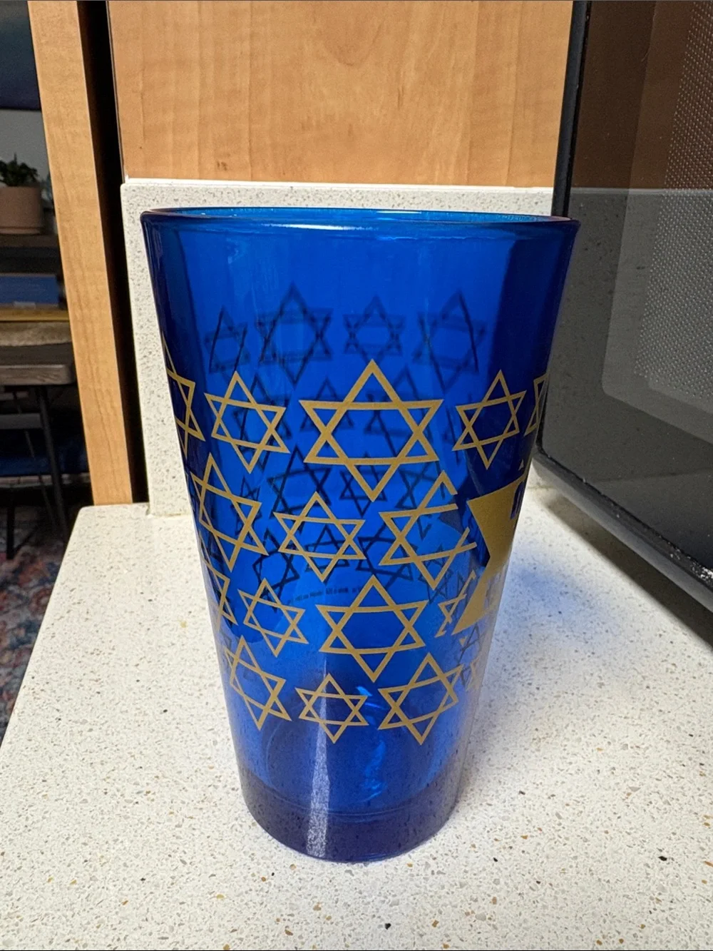 Urban Outfitters Blue Pint Glass with Gold Star and Text